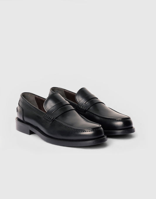 Mocassino penny loafer in pelle nera con fascia cucita