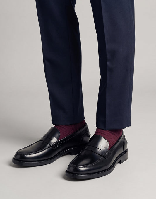 Mocassino penny loafer in pelle nera con fascia cucita